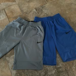 Nike basketball shorts. Gray and blue color. Inner drawstring. Same style.